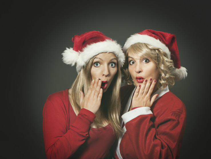 Two Santagirls looking surprised
